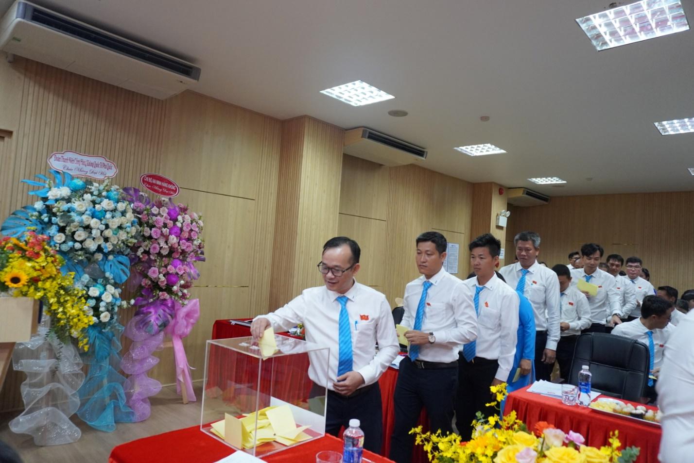 A group of men in white shirts and blue tiesAI-generated content may be incorrect.
