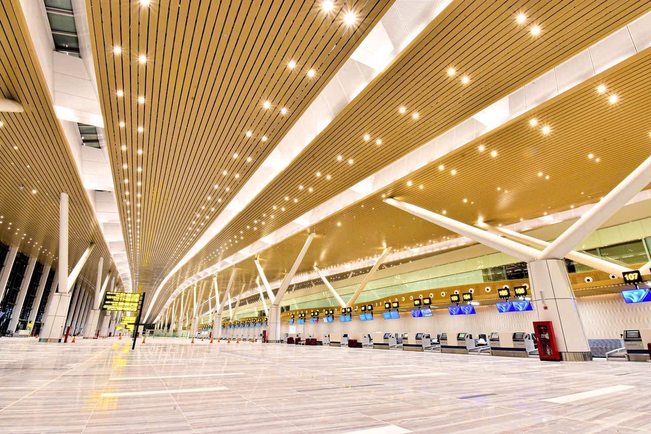 A large airport terminal with many lightsAI-generated content may be incorrect.
