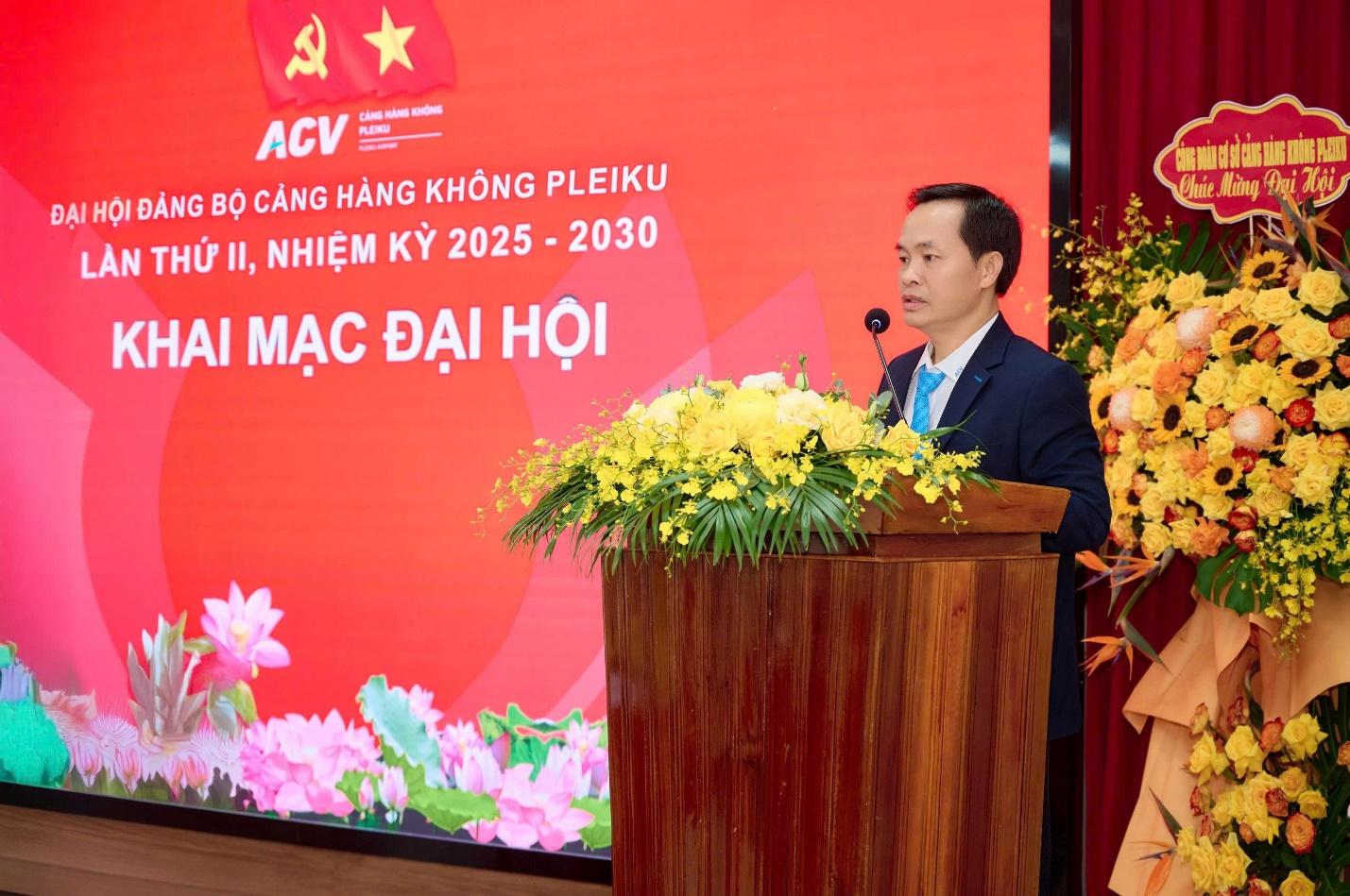 A person standing at a podium with flowersAI-generated content may be incorrect.