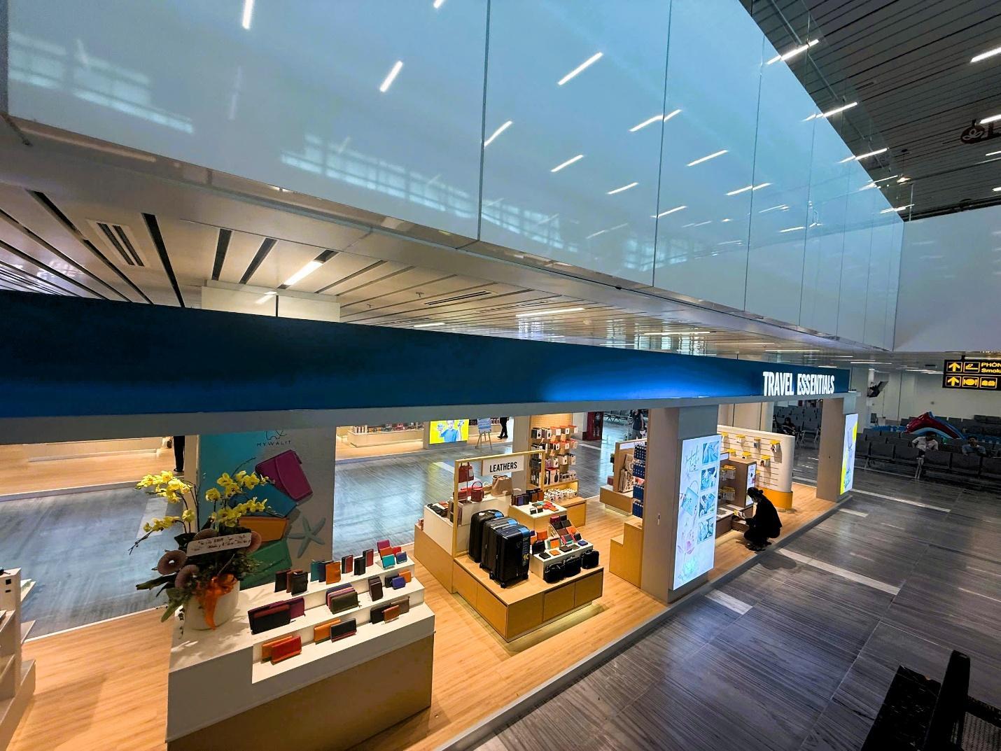 A storefront with a blue awningAI-generated content may be incorrect.