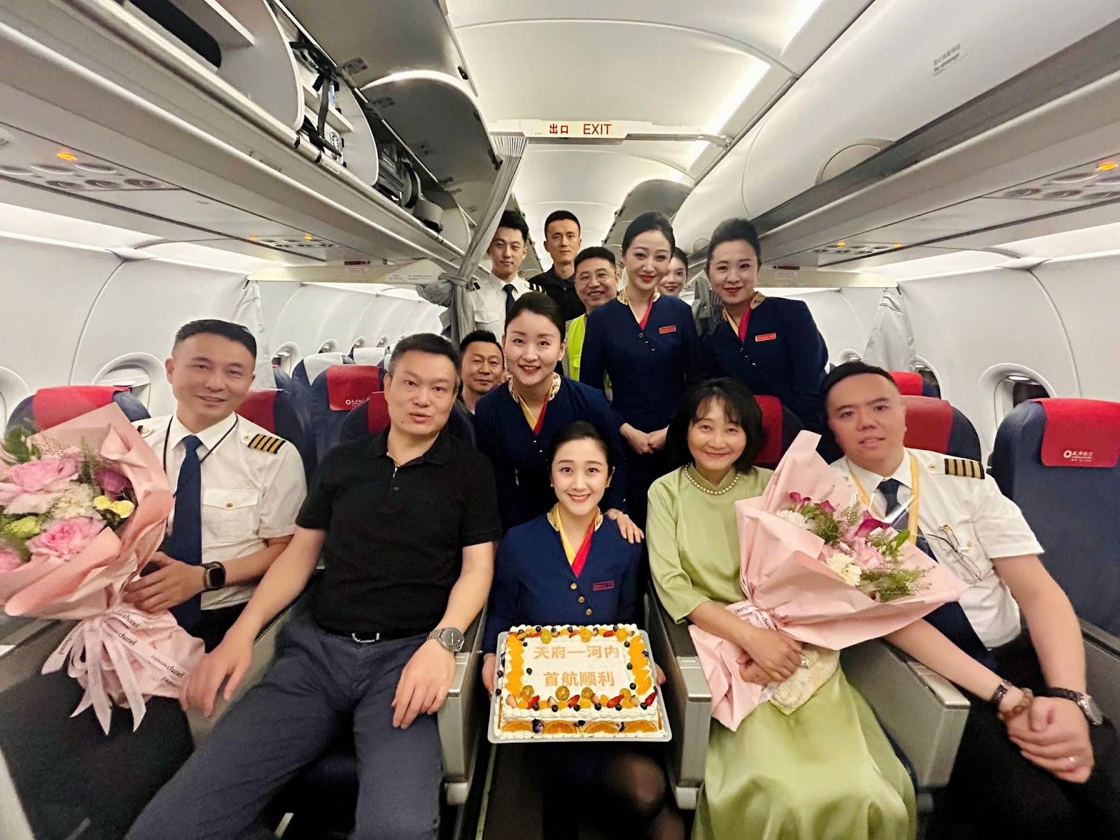A group of people in an airplaneAI-generated content may be incorrect.