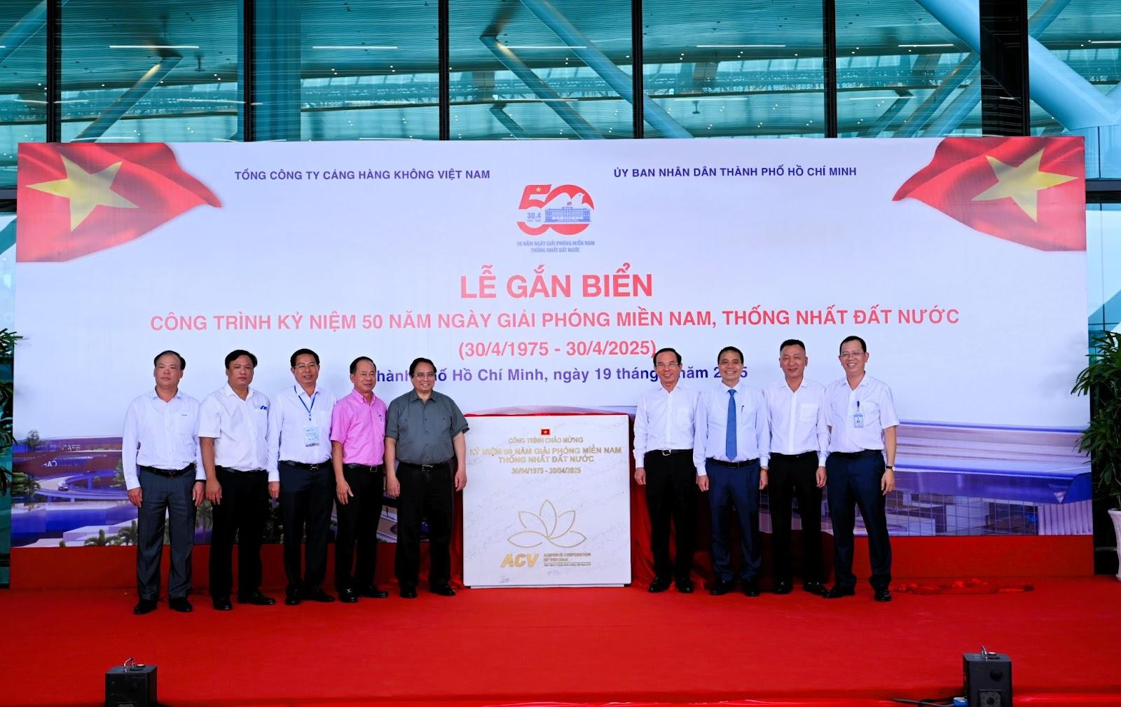 A group of people standing in front of a bannerAI-generated content may be incorrect.